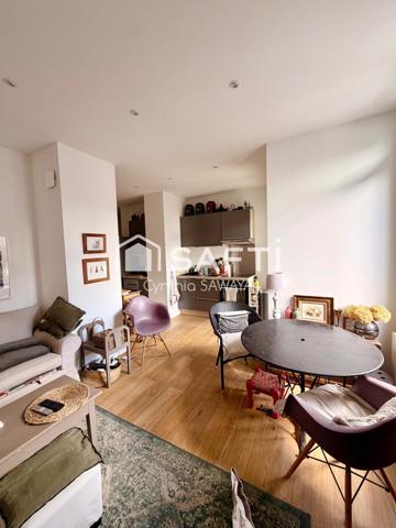 Bel appartement rénové, centre ville, avec ascenseur, place de parking couverte et balcon!