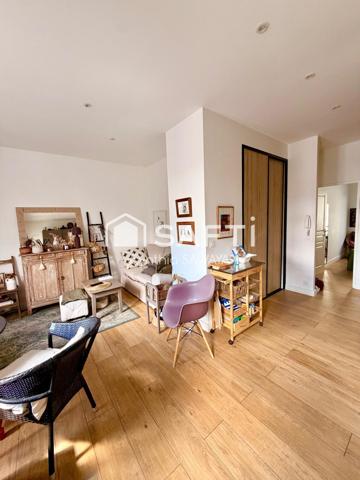 Bel appartement rénové, centre ville, avec ascenseur, place de parking couverte et balcon!