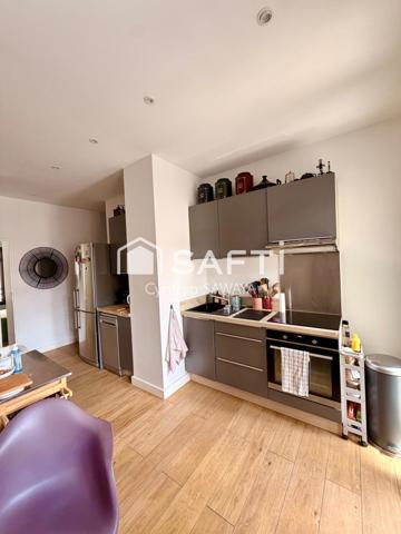 Bel appartement rénové, centre ville, avec ascenseur, place de parking couverte et balcon!