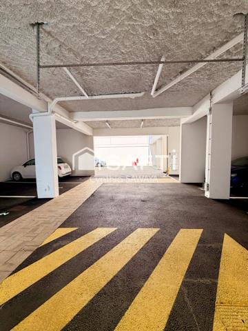 Bel appartement rénové, centre ville, avec ascenseur, place de parking couverte et balcon!