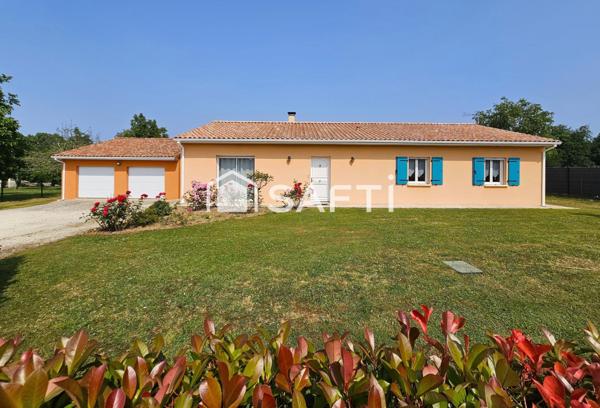 Maison plain-pied 4 chambres 182 m² + 80 m² de garage.