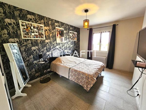 Maison plain-pied 4 chambres 182 m² + 80 m² de garage.