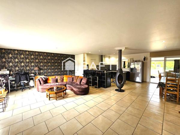 Maison plain-pied 4 chambres 182 m² + 80 m² de garage.