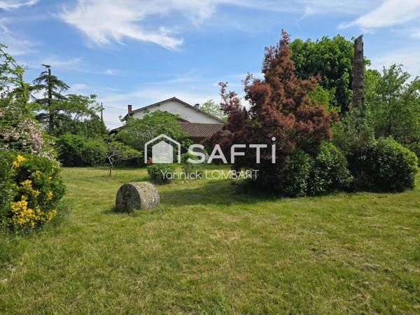 Maison familiale de 218 m² habitables sur 3000 m² de terrain arboré