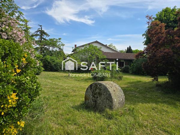 Maison familiale de 218 m² habitables sur 3000 m² de terrain arboré