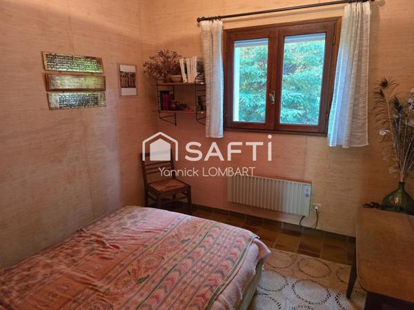 Maison familiale de 218 m² habitables sur 3000 m² de terrain arboré