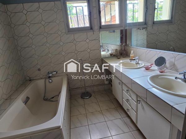Maison familiale de 218 m² habitables sur 3000 m² de terrain arboré