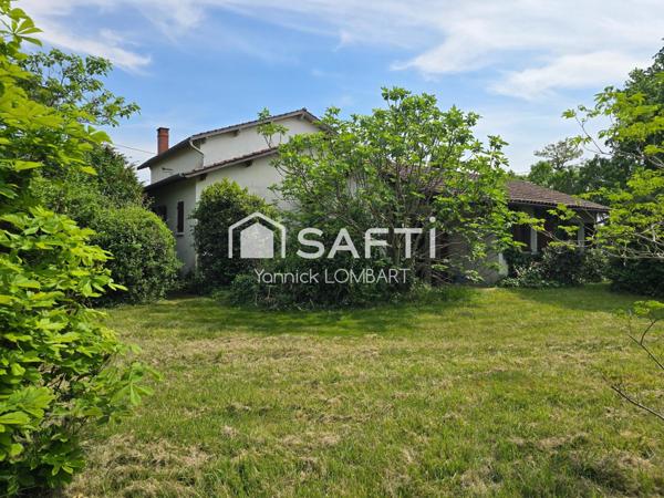 Maison familiale de 218 m² habitables sur 3000 m² de terrain arboré
