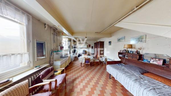 Mardeuil ( 51530 ) : Ensemble immobilier à rénover avec maison, cave, jardin, garages et dépendances