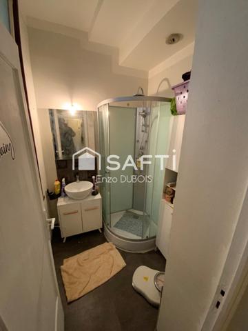 Rez-de-chaussée cosy dans immeuble d’époque, hypercentre