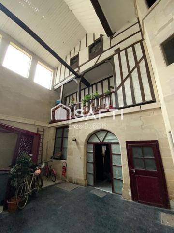 Rez-de-chaussée cosy dans immeuble d’époque, hypercentre