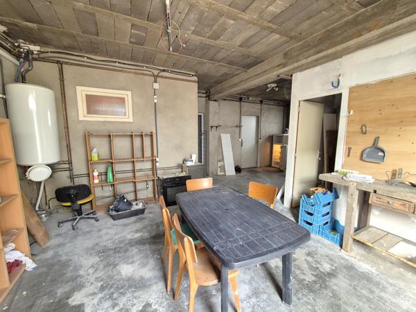 Maison 3 faces avec grand garage