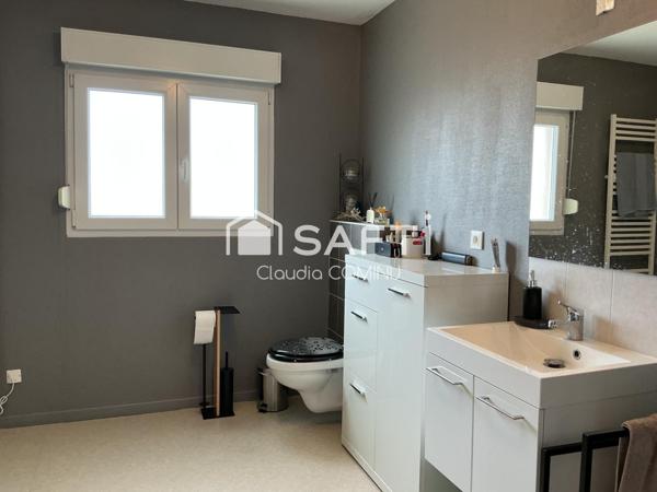 Appartement 100 m2 avec terrasse et parkings