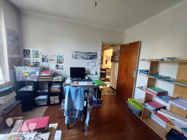 Saint-Gaudens, proche des commodités, maison de ville divisée en deux appartements indépendants.