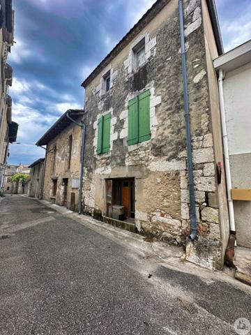 Immeuble d'habitation avec local commercial