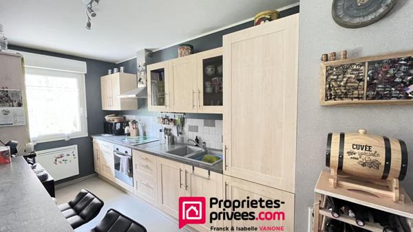 Appartement Type 3 - 73 m² habitables - place de parking privative + 1 garage - jardin