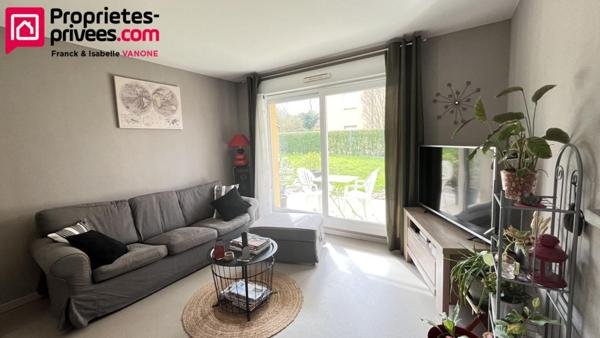 Appartement Type 3 - 73 m² habitables - place de parking privative + 1 garage - jardin
