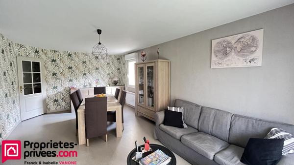 Appartement Type 3 - 73 m² habitables - place de parking privative + 1 garage - jardin