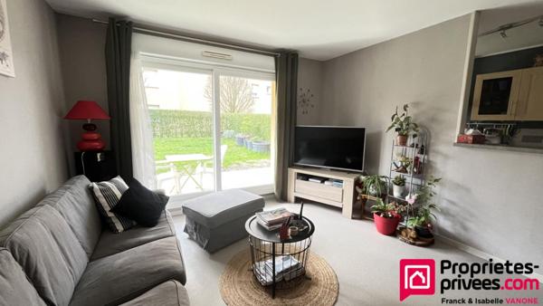 Appartement Type 3 - 73 m² habitables - place de parking privative + 1 garage - jardin