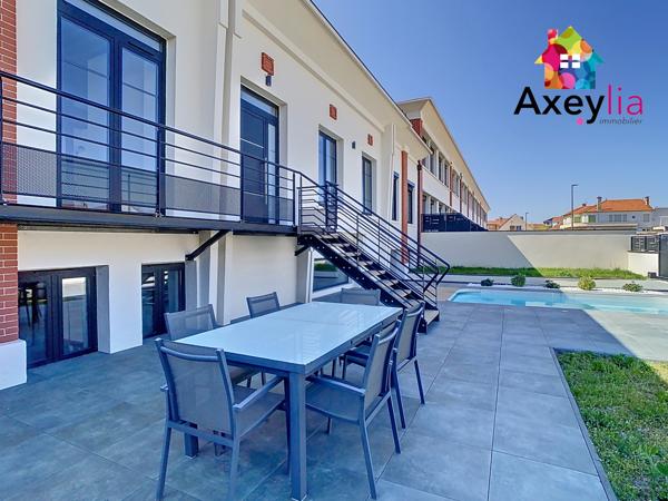 Roanne (42300) A VENDRE- ROANNE BORD DE LOIRE - MAISON DE VILLE TYPE LOFT AVEC TERRAIN ET PISCINE