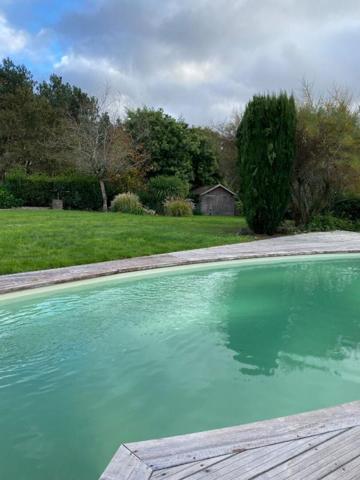 Aux portes de Vannes 10' du port  maison 145M2 avec piscine et jardin 1500M2