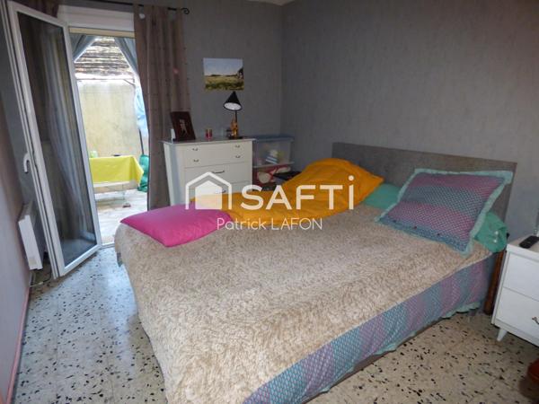 Immeuble 3 Appartements terrasses et garage.