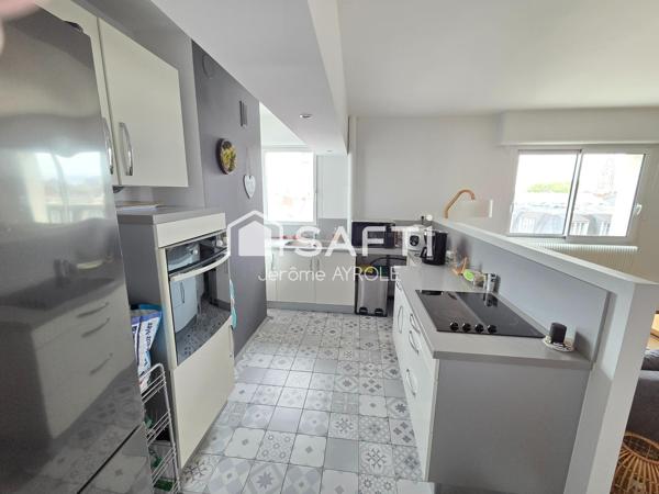 Appartement 64 m2 en hypercentre avec vue imprenable + parking + cave