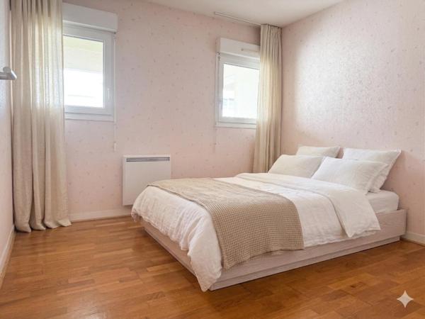 Appartement 76 m² très lumineux DPE C 3? étage avec ascenseur place de parking privative