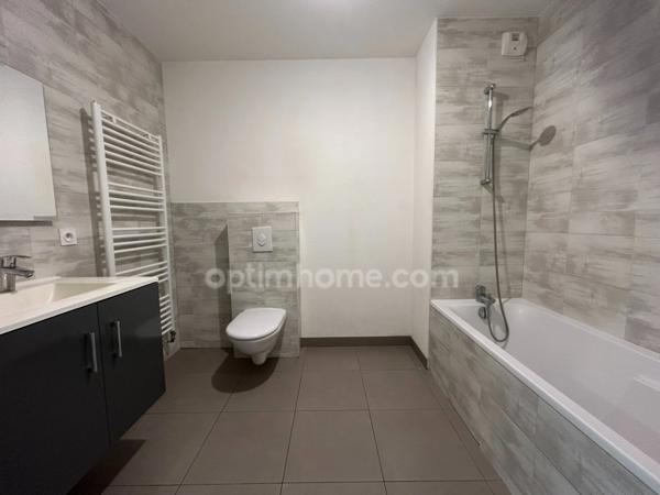 SAINT-LOUIS NEUWEG, résidence de Standing, superbe appartement rez de jardin 2pièces, terrasse, jardin privatif, cave, garage. Cadre verdoyant.