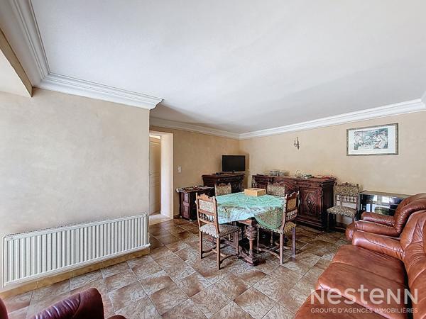 A Vendre Maison de ville en pierre de 123 m² habitable de plain-pied à proximité immédiate des commodités