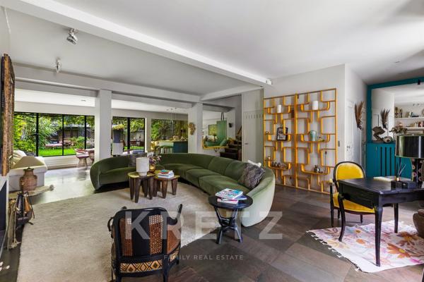 Une maison à Paris avec 170m2 de jardin - DPE D