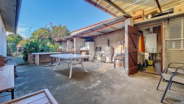 Maison de ville avec jardin attenant