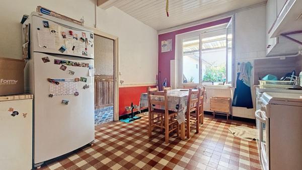 Maison de ville avec jardin attenant