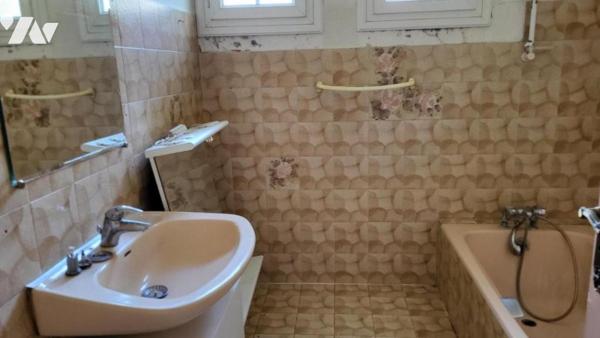 Dans un quartier résidentiel, pavillon sur 1420 m²