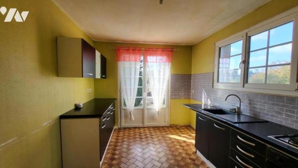 Dans un quartier résidentiel, pavillon sur 1420 m²