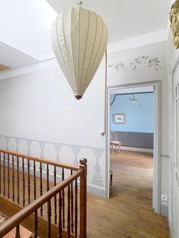 Maison ancienne avec atelier et joli jardin en ville