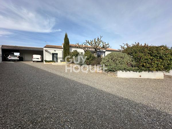 MINERVOIS - Maison plain pied 4 chambres avec garage et jardin.