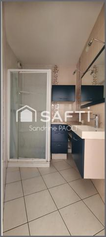 Appartement idéalement situé avec balcon et garage