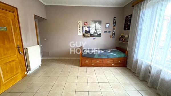 Charmant T4 de plus de 100m² avec une belle hauteur sous plafond avec stockage et garage