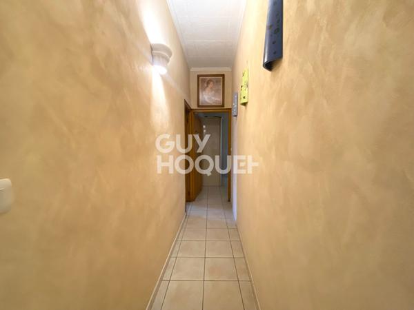 Charmant T4 de plus de 100m² avec une belle hauteur sous plafond avec stockage et garage