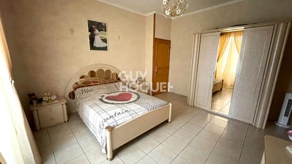 Charmant T4 de plus de 100m² avec une belle hauteur sous plafond avec stockage et garage