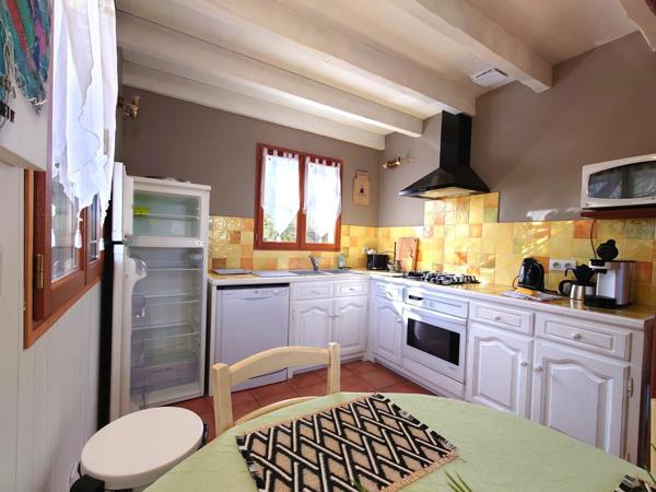 MAISON OSSATURE BOIS DANS SON ECRIN DE VERDURE