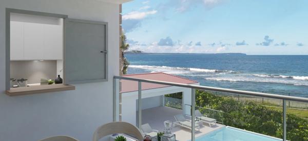 A VENDRE appartement T3 face piscine et face mer en RDC à Moule