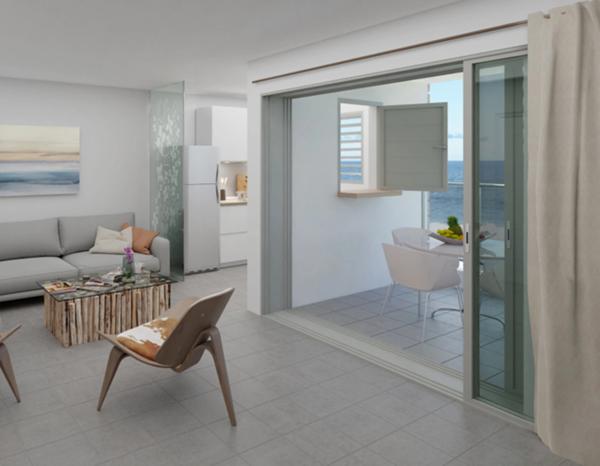 A VENDRE appartement T3 face piscine et face mer en RDC à Moule