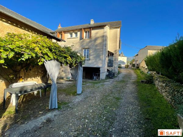 Maison de 235 m2 au coeur de Montbazens avec terrain