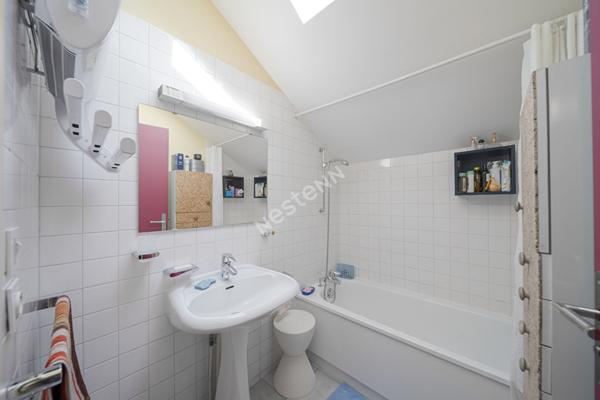 Maison spacieuse à vendre à Chalon-sur-Saône - 4 chambres, jardin et garage !