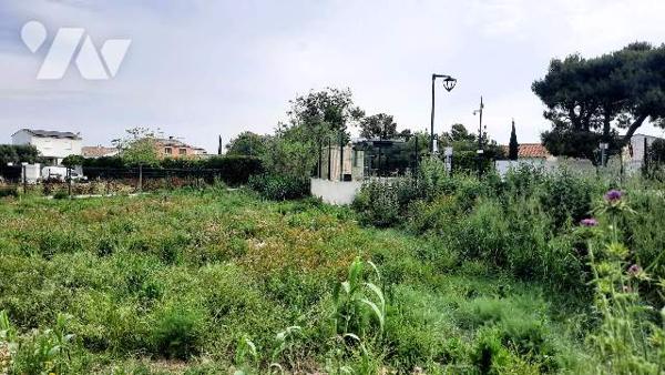 Terrain plat à Bâtir de 600m²
