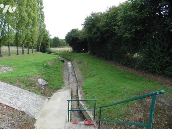 Terrain clos contenant deux étangs tout équipés