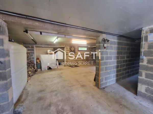 Maison familiale avec véranda plein sud et jardin arboré : un havre de paix à Saint-Hilaire-Petitville.