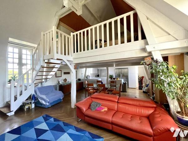 Appartement duplex rénové dans résidence ancienne 